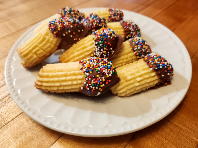 Italian Butter Cookies
 Chocolate dipped cookies, supremely
 buttery and rich, wonderfully tender
 and melts in your mouth.