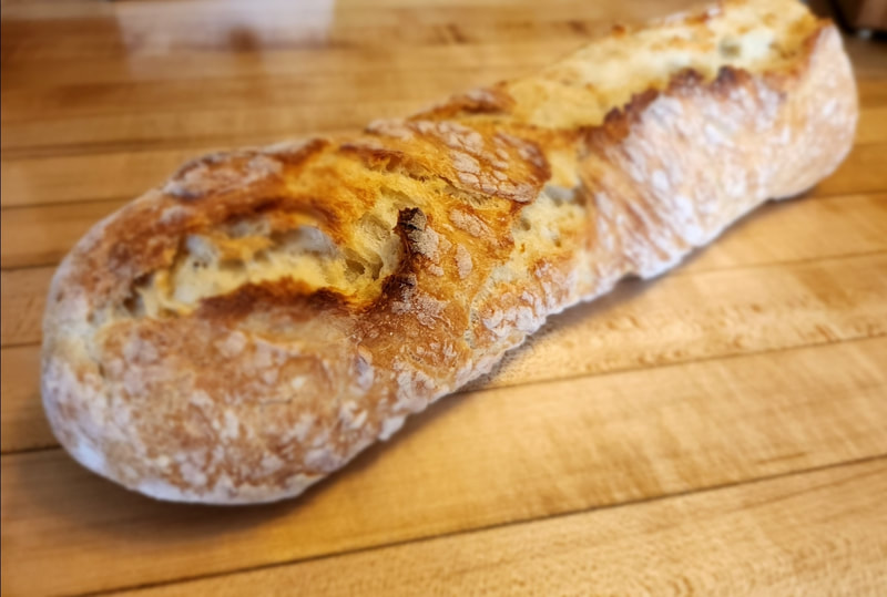 Baquette
14" Italian rustic bread, long and thin. Soft and
 delicate on the inside with crisp and crunchy
 crust.